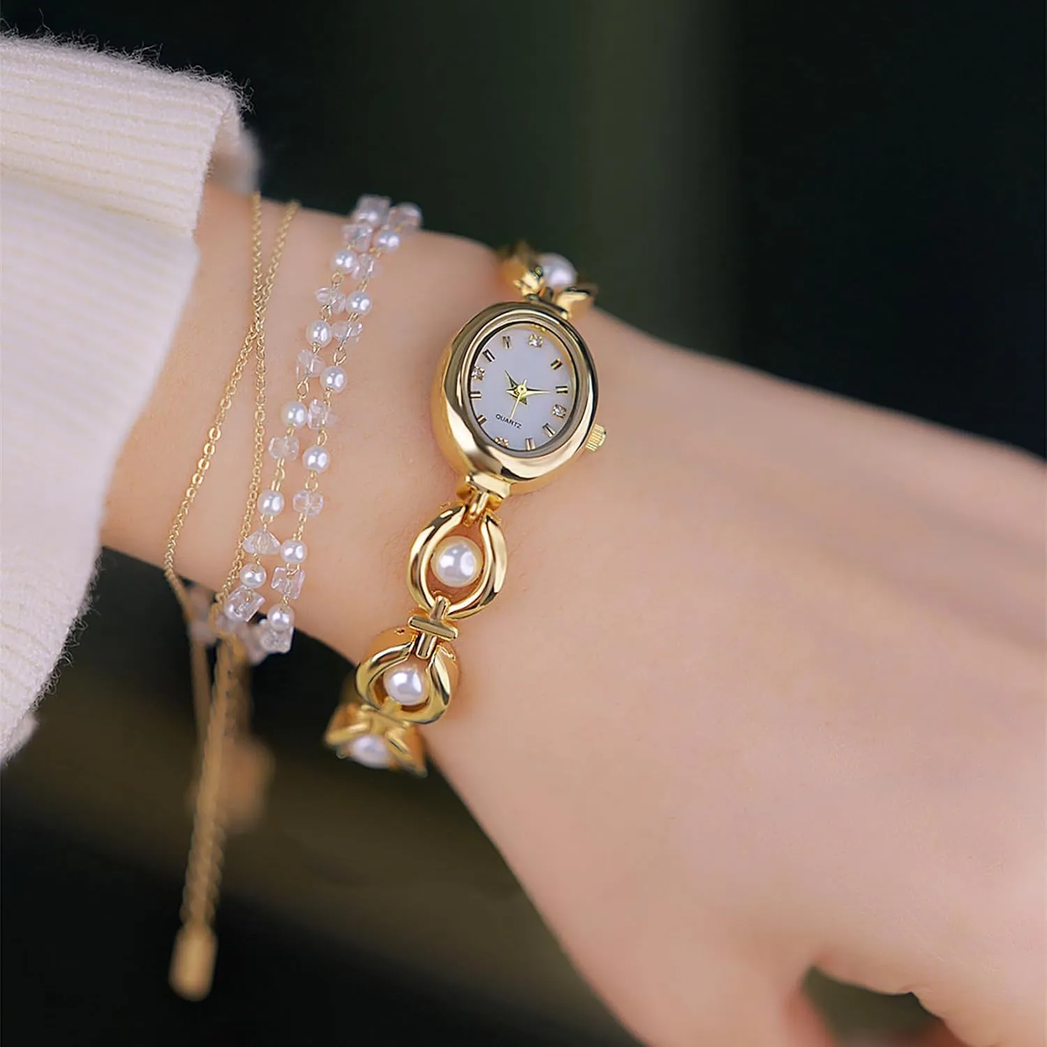 BESTKANG Elegant Women's Gold Vintage Bracelet Watch - Oval Dial Quartz Dress Watch - Waterproof Fashion Wristwatch for Women
