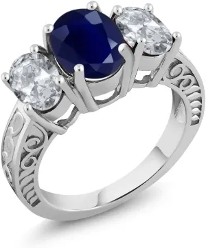 Gem Stone King 925 Sterling Silver Blue Sapphire and White Topaz 3-Stone Engagement Ring For Women (4.40 Cttw, Oval 9X7MM and 7X5MM, Available in size 5, 6, 7, 8, 9)