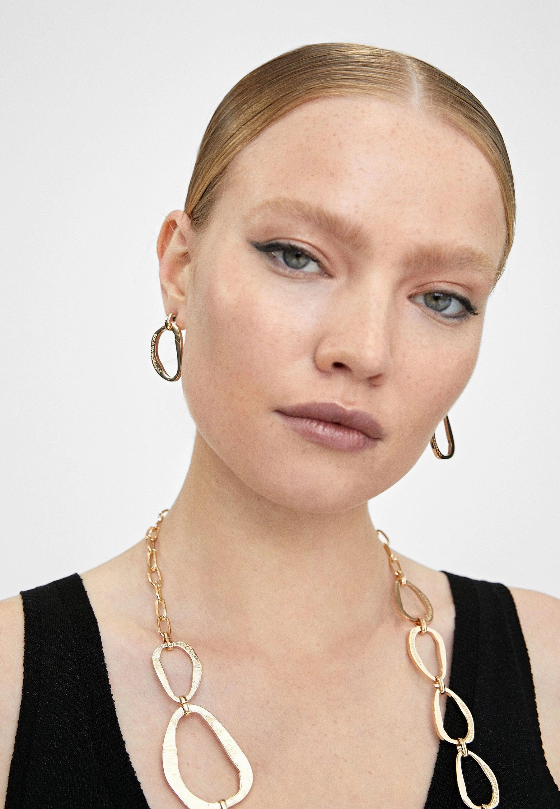 Small golden oval earrings